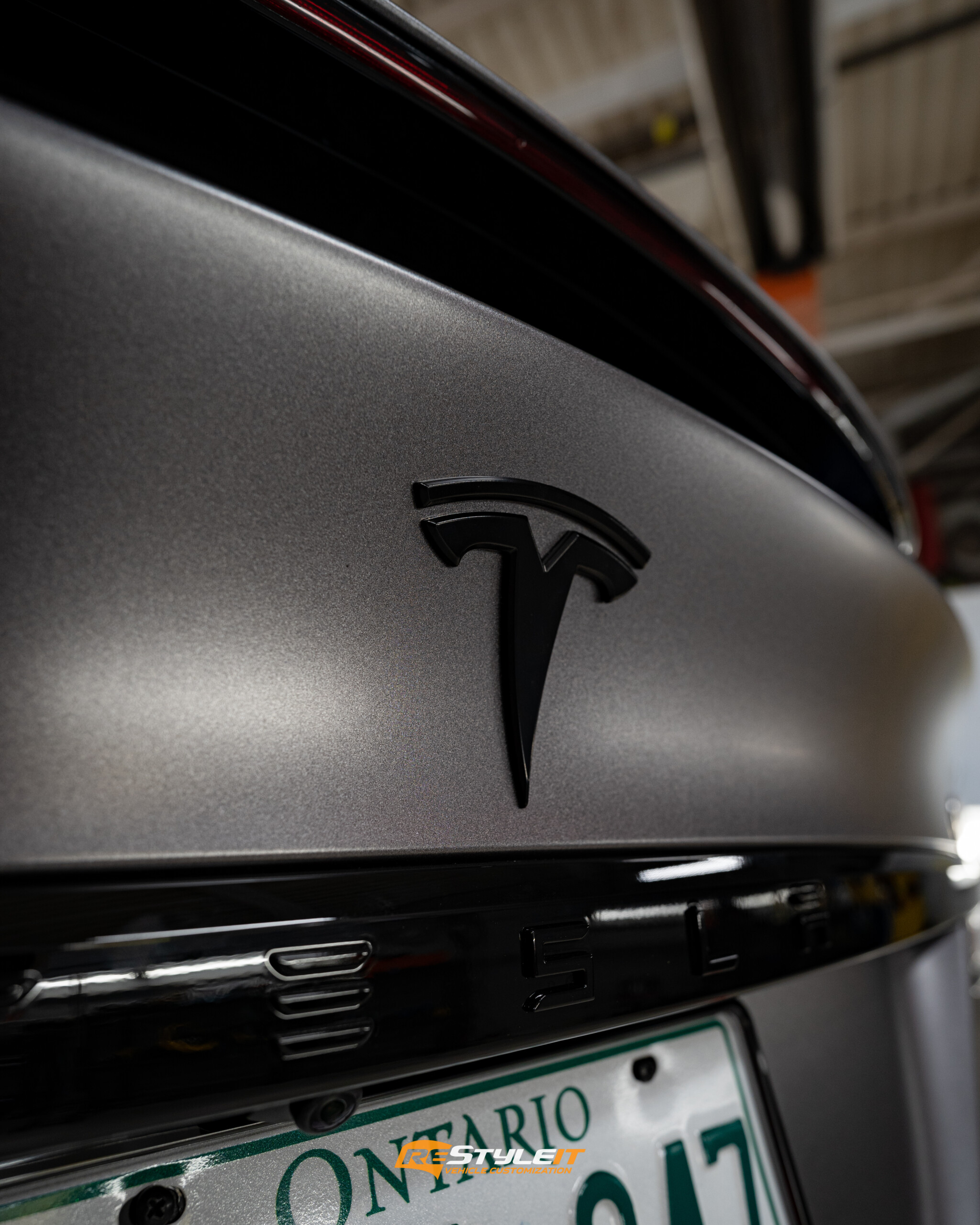 "Satin Dark Grey Transformation: Wrapping the Tesla Model X into a Flawless Jewel"